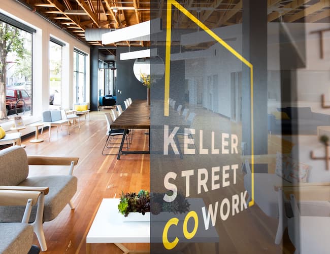 Group meeting room/lounge office with a sign reading Keller Street Cowork